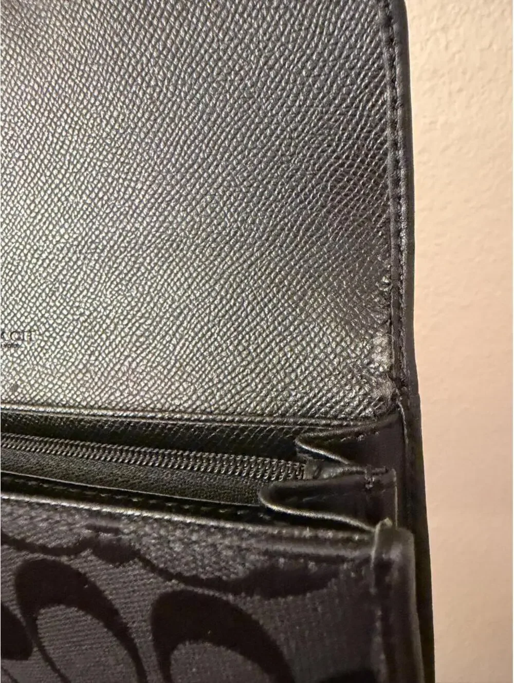 Black Coach Wallet with Silver Emblem